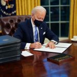 biden signing the continen times